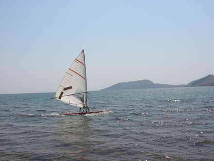 Windsurfer in the background of the Cape Ivan-Baba