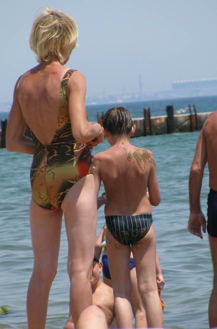 The family of athletes on the beach